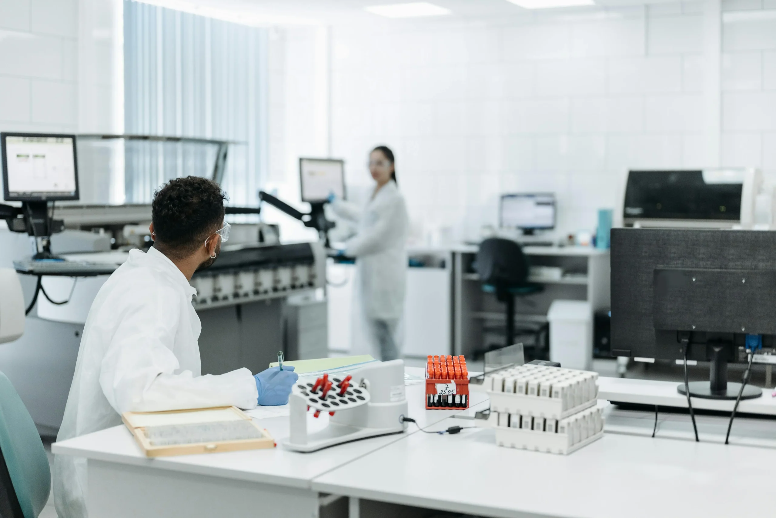 scientists in laboratory working